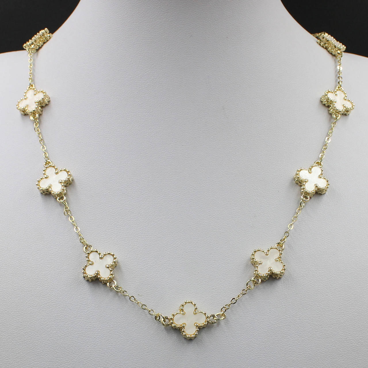 Колье женское Van Cleef однорядное золотое длинное цепочка 60 см с кулончиками молочного цвета
Колье женское Van Cleef однорядное золотое длинное цепочка 60 см с кулончиками молочного цвета