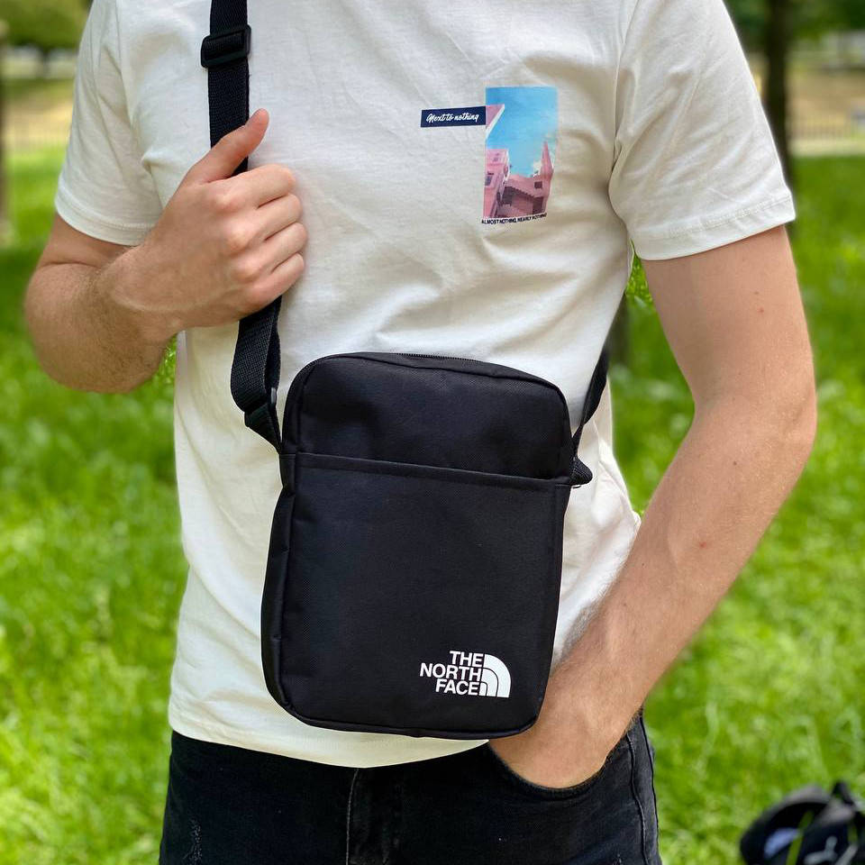 Мужская сумка через плечо The North Face черная спортивная тканевая барсетка TNF мессенджер ТНФ цвет черный
Мужская сумка через плечо The North Face черная спортивная тканевая барсетка TNF мессенджер ТНФ цвет черный