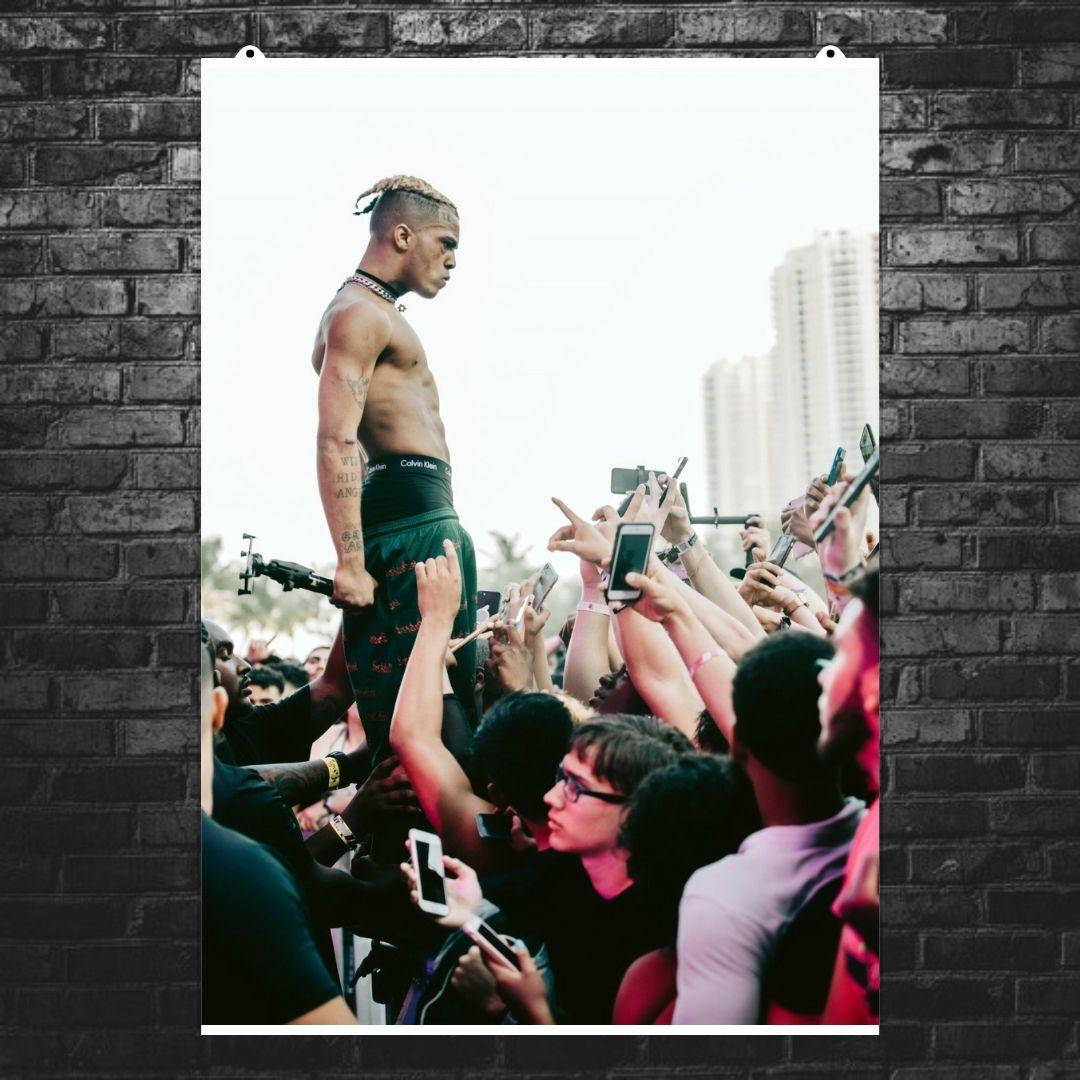 Постер "XXXTentacion в толпе". Рэпер Джасей Дуэйн Рикардо Онфрой. Размер 60x42см (A2). Матовая бумага
Постер "XXXTentacion в толпе". Рэпер Джасей Дуэйн Рикардо Онфрой. Размер 60x42см (A2). Матовая бумага