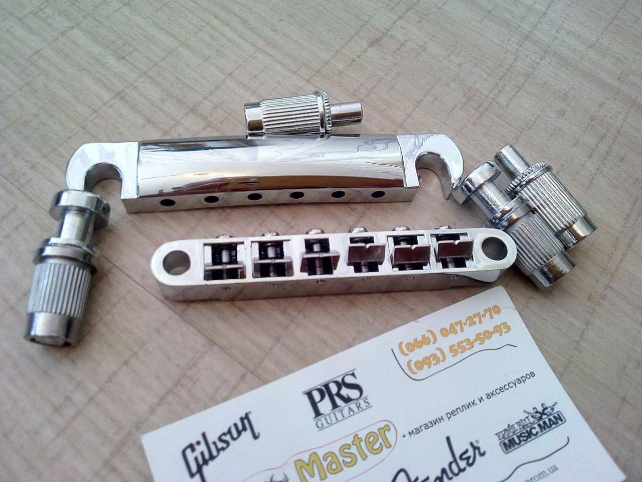 Тюноматик струнодержатель бридж Tune-o-matic для электрогитары гитары Gibson SG Les Paul ES ХРОМ
Тюноматик струнодержатель бридж Tune-o-matic для электрогитары гитары Gibson SG Les Paul ES ХРОМ