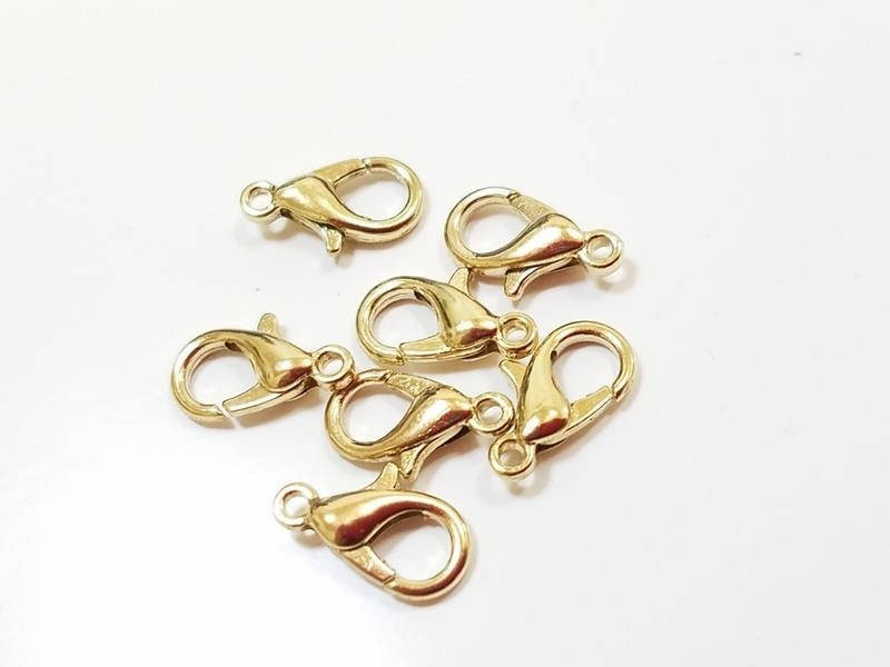 Замки 12 мм 100 шт цвет золото
Замки 12 мм 100 шт цвет золото