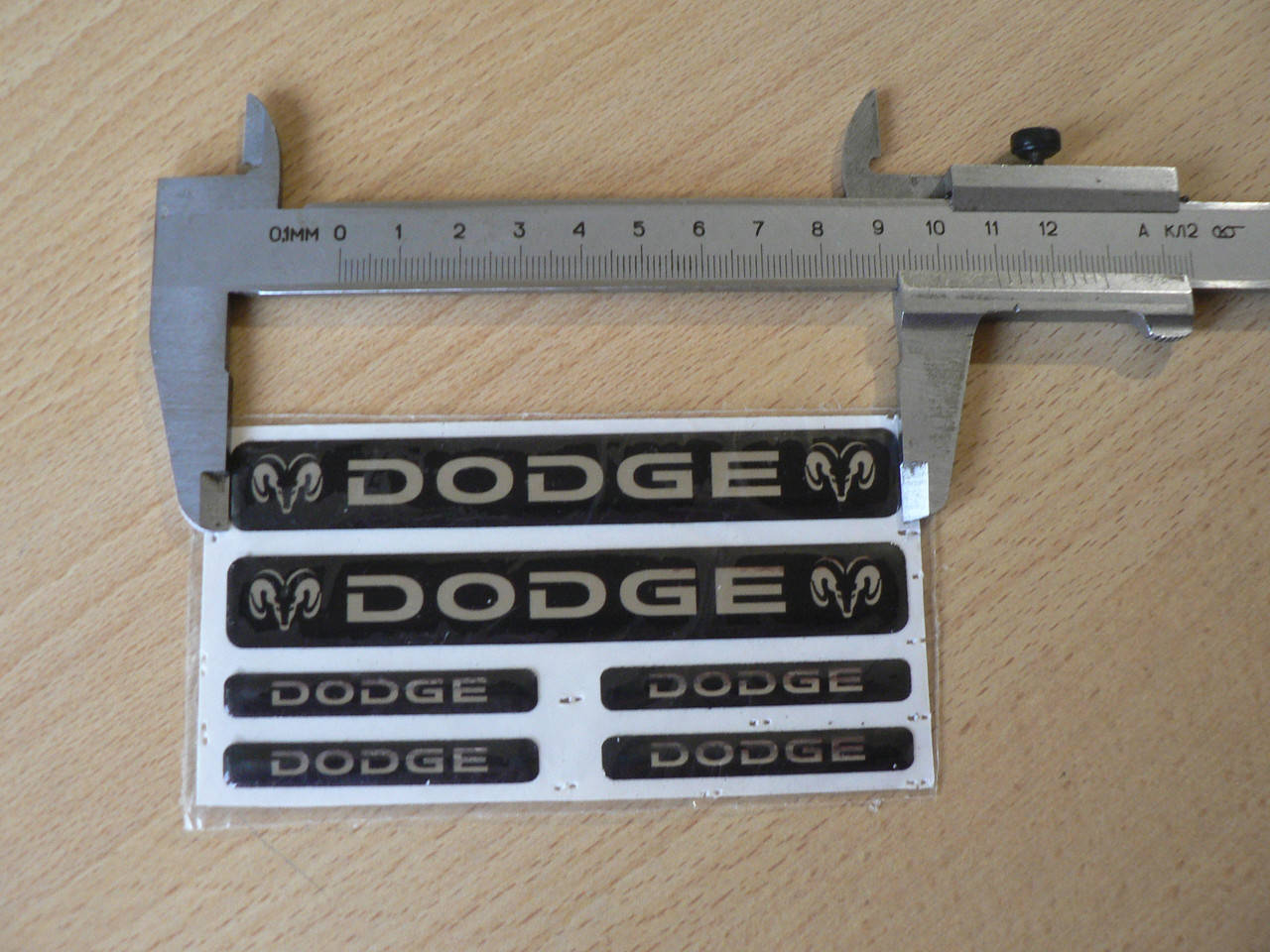 Наклейка s маленькая Dodge набор 6шт (2шт-11х1.5см и 5х0,7см 4шт) силиконовая надпись на авто эмблема Додж
Наклейка s маленькая Dodge набор 6шт (2шт-11х1.5см и 5х0,7см 4шт) силиконовая надпись на авто эмблема Додж