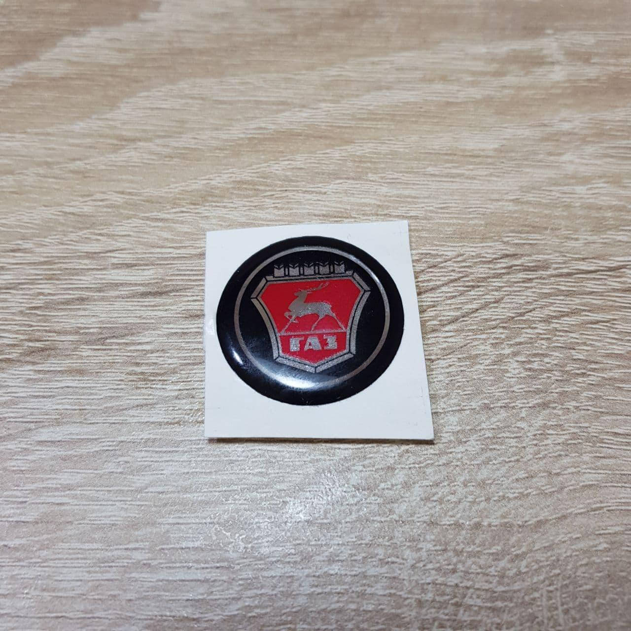 Эмблема (орнамент) колеса рулевого (руля) Волга, ГАЗ 3110,31105 (покупн. ГАЗ)
Эмблема (орнамент) колеса рулевого (руля) Волга, ГАЗ 3110,31105 (покупн. ГАЗ)