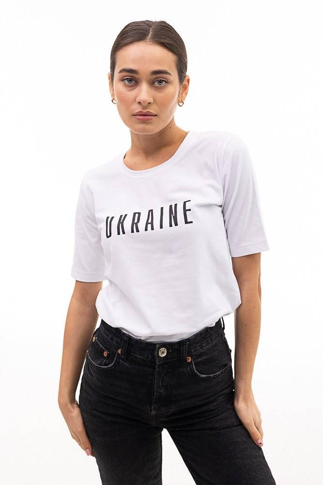 Женская футболка патриотическая "Ukraine" белая Modna KAZKA MKAR46584-1 44, Белый 
Женская футболка патриотическая "Ukraine" белая Modna KAZKA MKAR46584-1 44, Белый