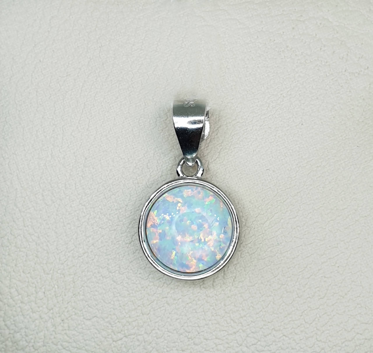 Кулон серебряный с белым опалом 1,28 г
Кулон серебряный с белым опалом 1,28 г