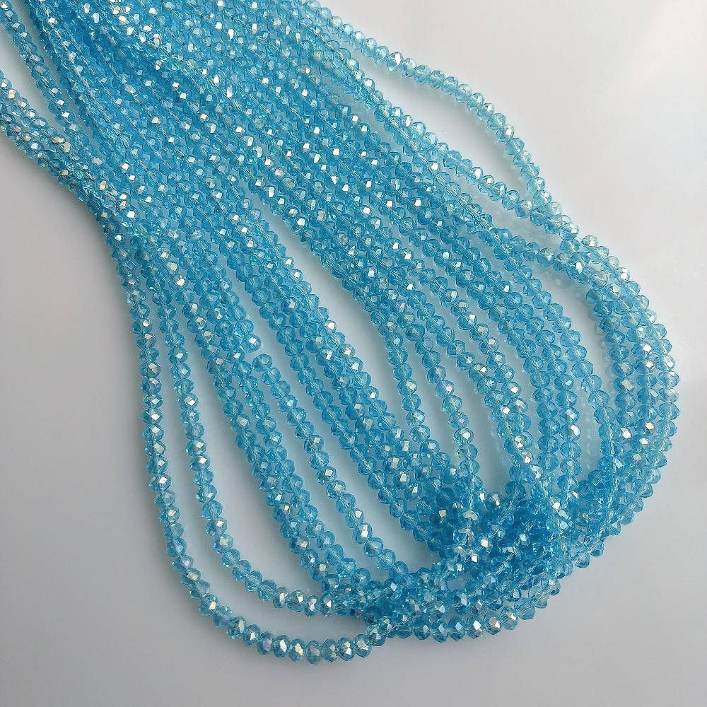 Бусины стекло прозрачное светло голубое с напылением "рондель" d-3,5х2,5мм нитка L-37см
Бусины стекло прозрачное светло голубое с напылением "рондель" d-3,5х2,5мм нитка L-37см