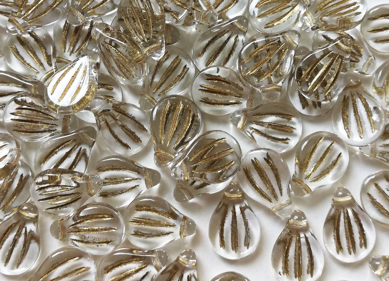 Preciosa Engraved Pip 9 x 14 mm Crystal Gold Painted
Preciosa Engraved Pip 9 x 14 mm Crystal Gold Painted