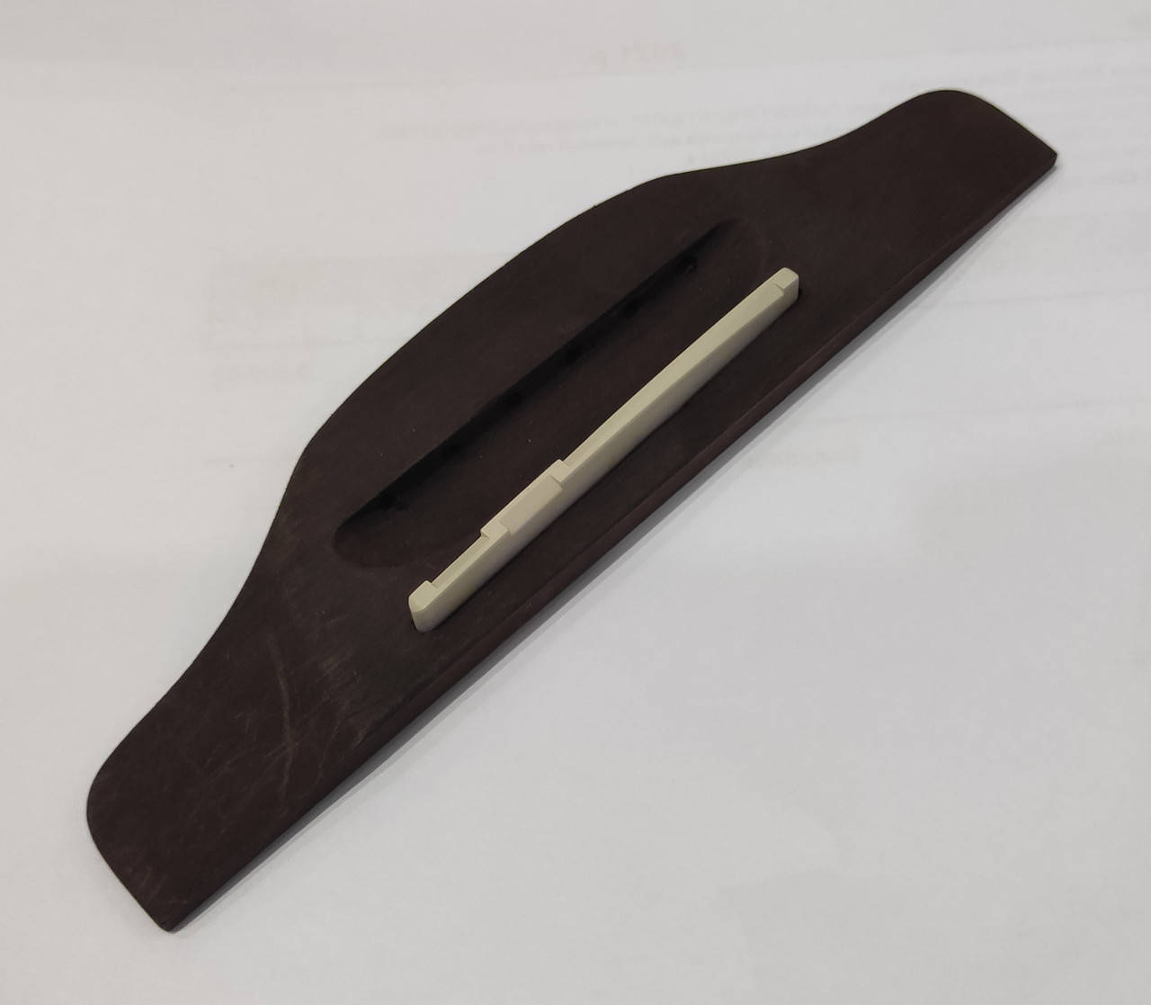 Струнодержатель для акустической гитары
Струнодержатель для акустической гитары