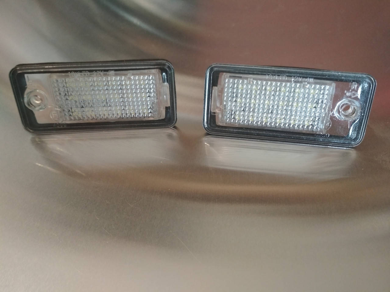Audi Q7 подсветка номера светодиодная 3528SMD LED 4W 2 шт комплект фонарь підсвітка номерного знаку диодная
Audi Q7 подсветка номера светодиодная 3528SMD LED 4W 2 шт комплект фонарь підсвітка номерного знаку диодная