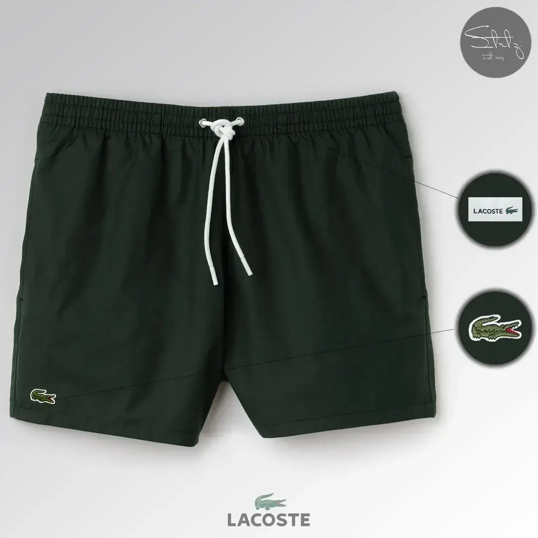 Мужские Купальные Шорты Lacoste Летние Стильные и Качественные Темно-Зеленые Шорты Лакоста Пляжные
Мужские Купальные Шорты Lacoste Летние Стильные и Качественные Темно-Зеленые Шорты Лакоста Пляжные
