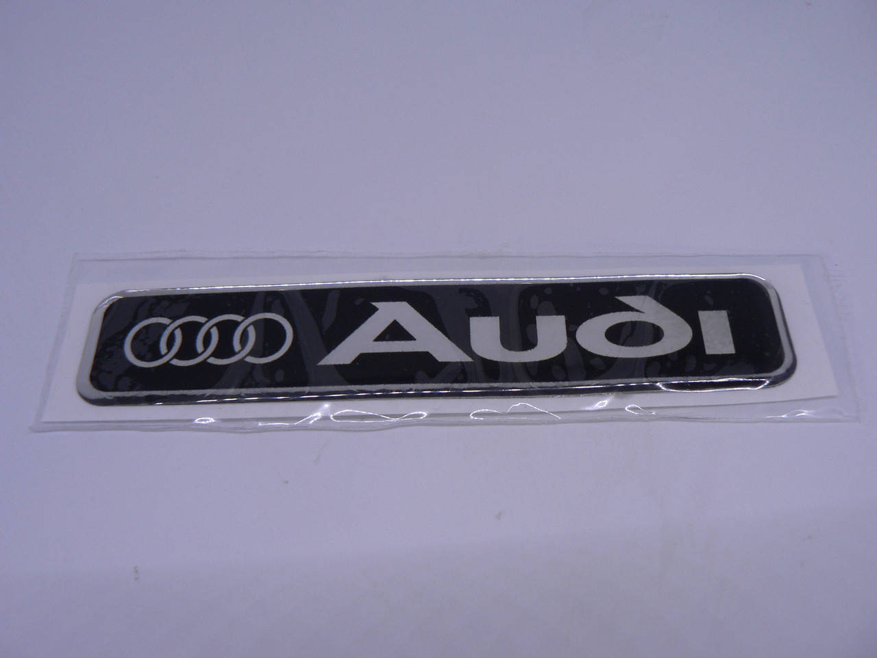 Наклейка s надпись Audi 100х20х1мм силиконовая полоска на авто эмблема логотип АУДИ серебристая фон черный
Наклейка s надпись Audi 100х20х1мм силиконовая полоска на авто эмблема логотип АУДИ серебристая фон черный