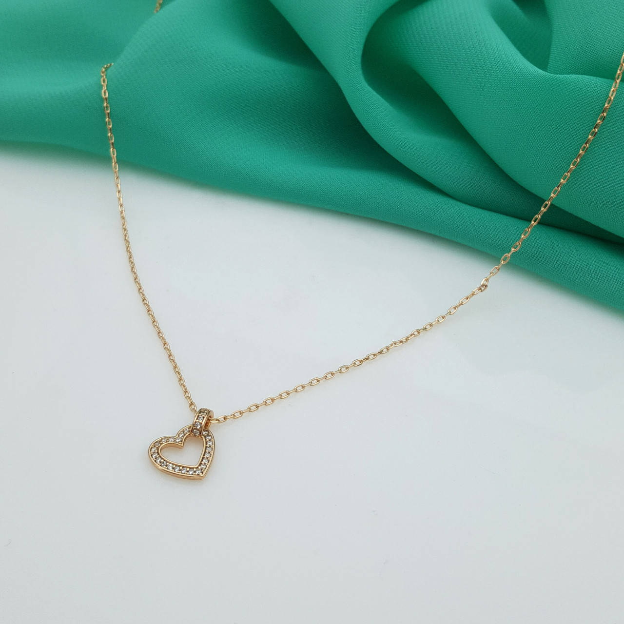 Подвеска сердце с камешками, р.40-45, медсплав Xuping, 18К
Подвеска сердце с камешками, р.40-45, медсплав Xuping, 18К