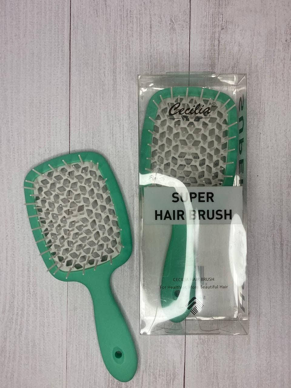 Пластиковая массажная расческа щетка Cecilia Super Hair Brush с нейлоновыми зубчиками Мятный матовый
Пластиковая массажная расческа щетка Cecilia Super Hair Brush с нейлоновыми зубчиками Мятный матовый
