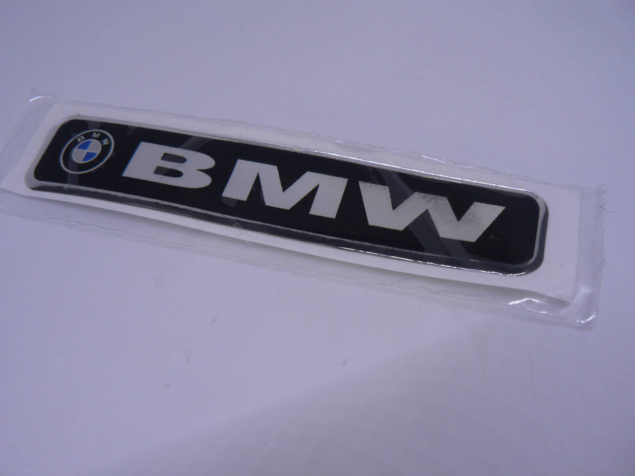 Наклейка s надпись BMW 100х20х1мм силиконовая полоска на авто эмблема логотип БМВ серебристая фон черный
Наклейка s надпись BMW 100х20х1мм силиконовая полоска на авто эмблема логотип БМВ серебристая фон черный