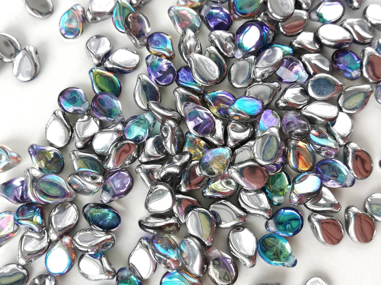 Pip 5*7 мм Crystal Silver Rainbow Чеські намистини. Скляні. Preciosa 
Pip 5*7 мм Crystal Silver Rainbow Чеські намистини. Скляні. Preciosa