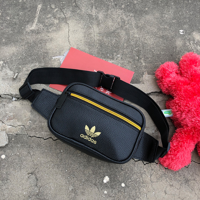 Поясная сумка Adidas из PU кожи. Стильная, удобная в использовании бананка Adidas на каждый день Черный_модель 2
Поясная сумка Adidas из PU кожи. Стильная, удобная в использовании бананка Adidas на каждый день Черный_модель 2