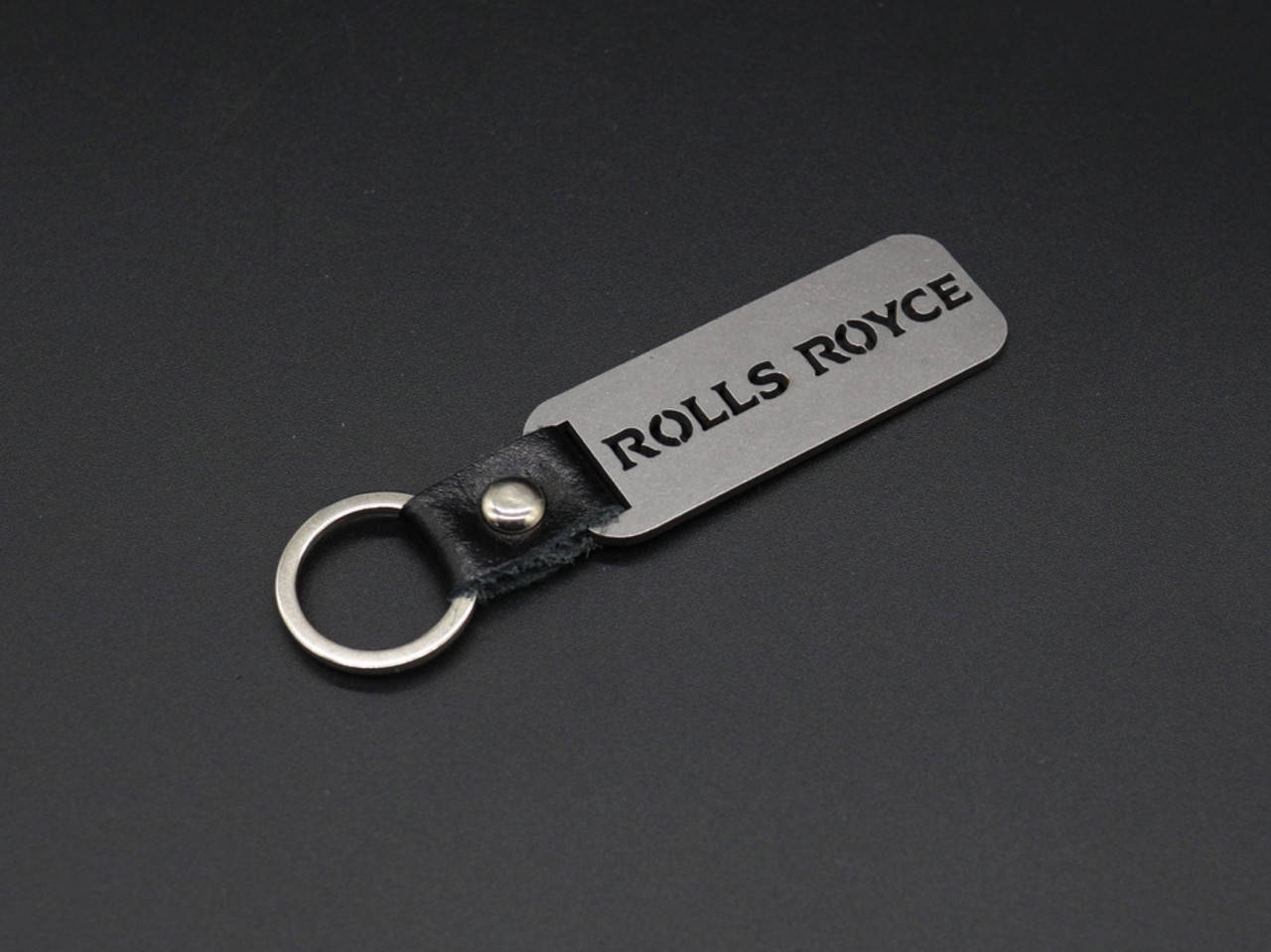 Брелок металлический. Rolls Royce. 10х2,5см, Коричневый 
Брелок металлический. Rolls Royce. 10х2,5см, Коричневый