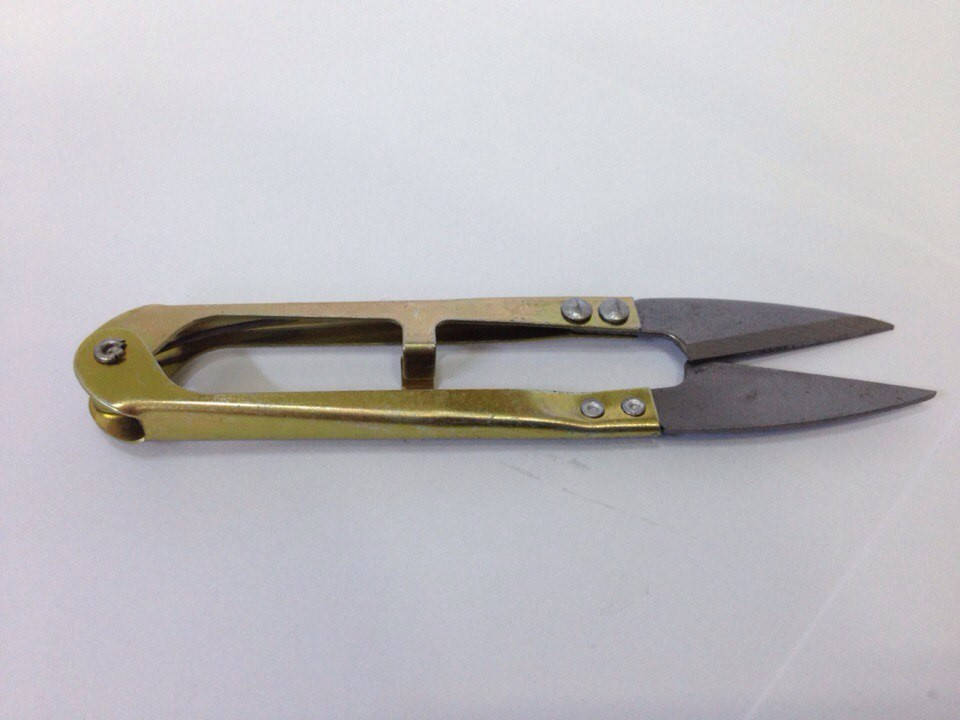 Нитеобрезатель
Нитеобрезатель