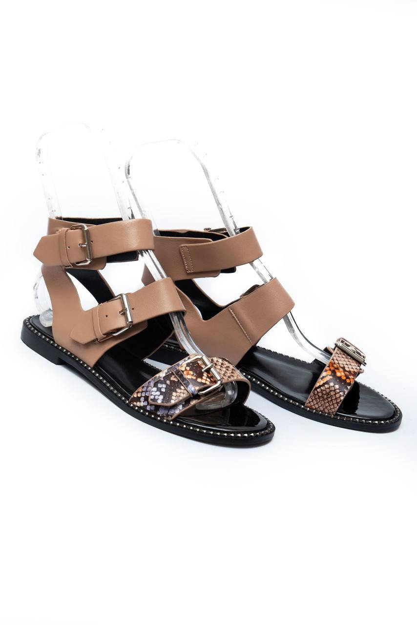 Женские бежевые кожаные сандалии Brocoly 36
Женские бежевые кожаные сандалии Brocoly 36