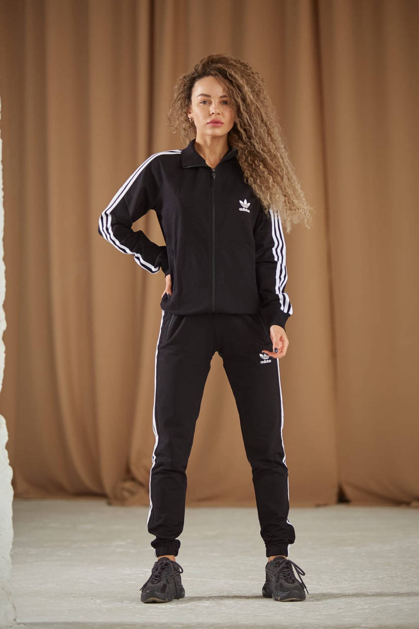 Женский спортивный костюм Adidas черный с белыми полосами хлопковый кофта и штаны. код KH-2028 L
Женский спортивный костюм Adidas черный с белыми полосами хлопковый кофта и штаны. код KH-2028 L