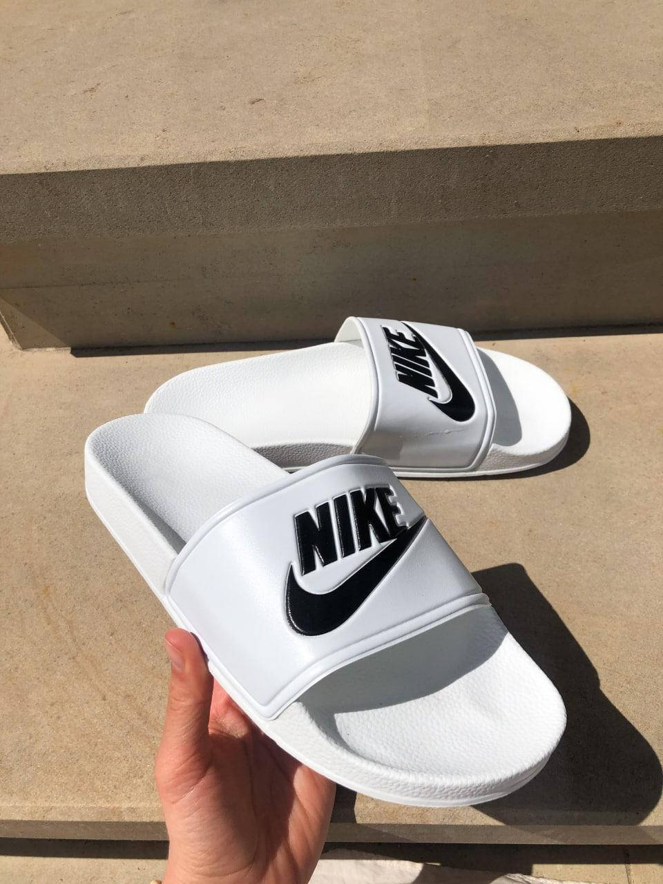 Мужские шлепанцы Nike белые с черным лого найк шлепки мужские тапочки спортивные сланцы мужские Nike Slides, Белый
Мужские шлепанцы Nike белые с черным лого найк шлепки мужские тапочки спортивные сланцы мужские Nike Slides, Белый