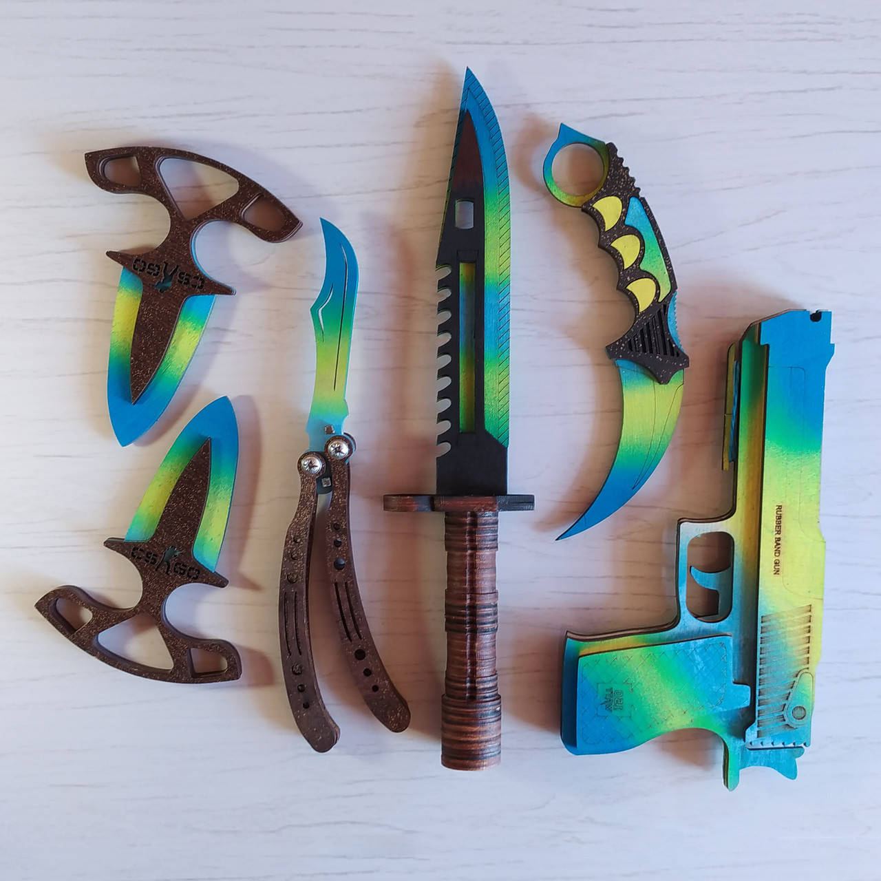 Набор деревянного оружия из игры CS:GO (КС:ГО) 6 шт. Бабочка, Штык Нож, Керамбит, Тычковые, Пистолет. Синий.
Набор деревянного оружия из игры CS:GO (КС:ГО) 6 шт. Бабочка, Штык Нож, Керамбит, Тычковые, Пистолет. Синий.