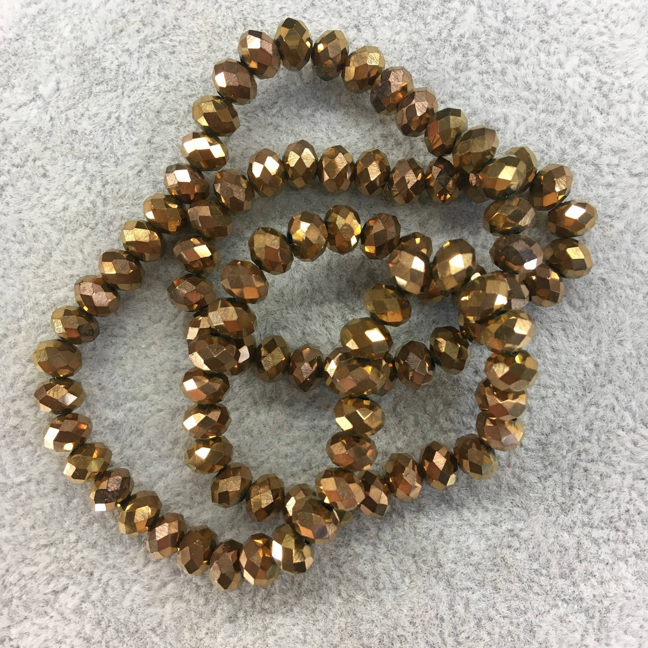 Бусины на нитке Стекло рондель d=6мм цвет медный металлик (~150 бусин на нитке)
Бусины на нитке Стекло рондель d=6мм цвет медный металлик (~150 бусин на нитке)