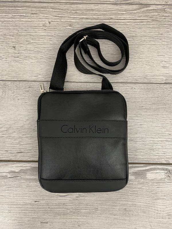 Мужская сумка через плечо calvin klein, вместительная барсетка, сумка черная кельвин кляйн
Мужская сумка через плечо calvin klein, вместительная барсетка, сумка черная кельвин кляйн