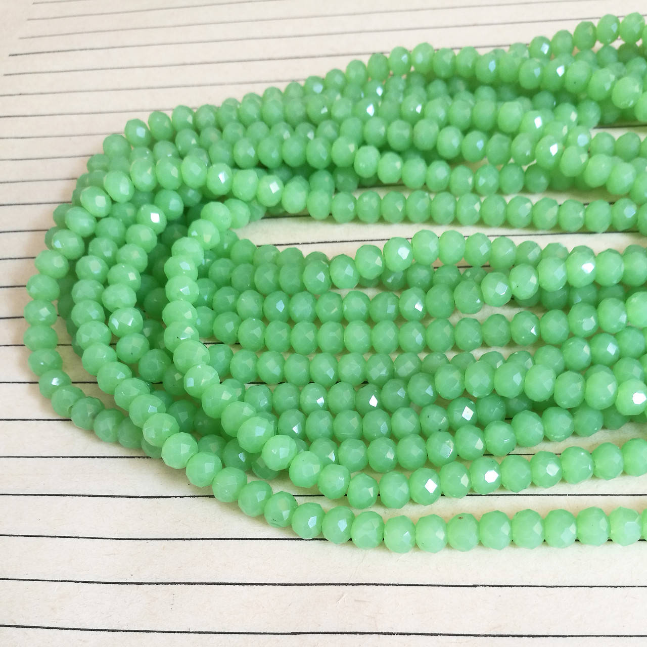 Кришталева намистина, рондель, салатова матова, 3х4 мм 
Кришталева намистина, рондель, салатова матова, 3х4 мм