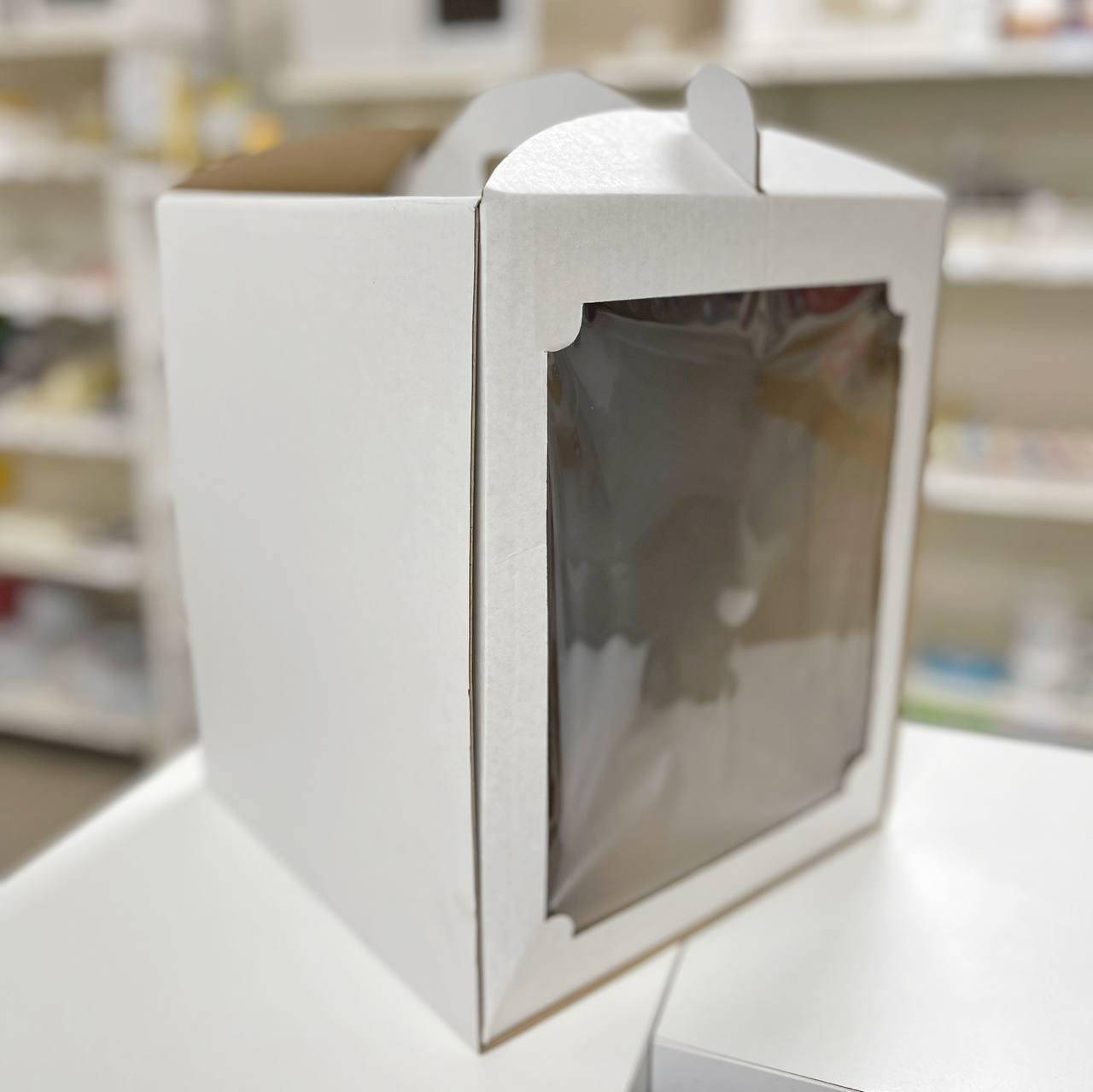 Коробка для торта 25х25х30 см. (с окошком) 
Коробка для торта 25х25х30 см. (с окошком)