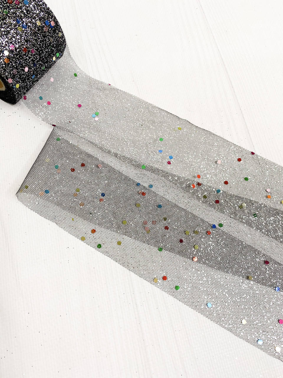 Фатин мелкий с блеском черный 5,5 см
Фатин мелкий с блеском черный 5,5 см