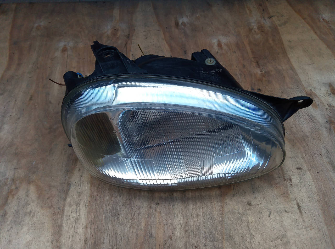 Фара Opel Corsa B , Combo Valeo 90386290 ( R )