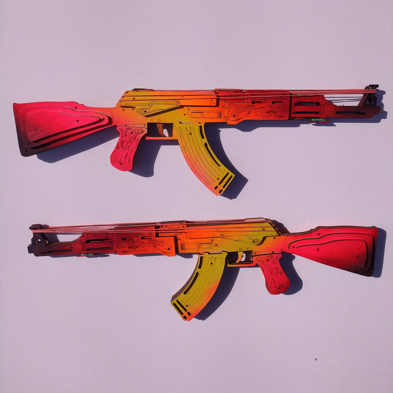 Деревянный Автомат Калашникова (АК-47) из CS:GO (КС:ГО) Стреляющий Резинками. Цвет: Красно-Желтый Градиент.
Деревянный Автомат Калашникова (АК-47) из CS:GO (КС:ГО) Стреляющий Резинками. Цвет: Красно-Желтый Градиент.