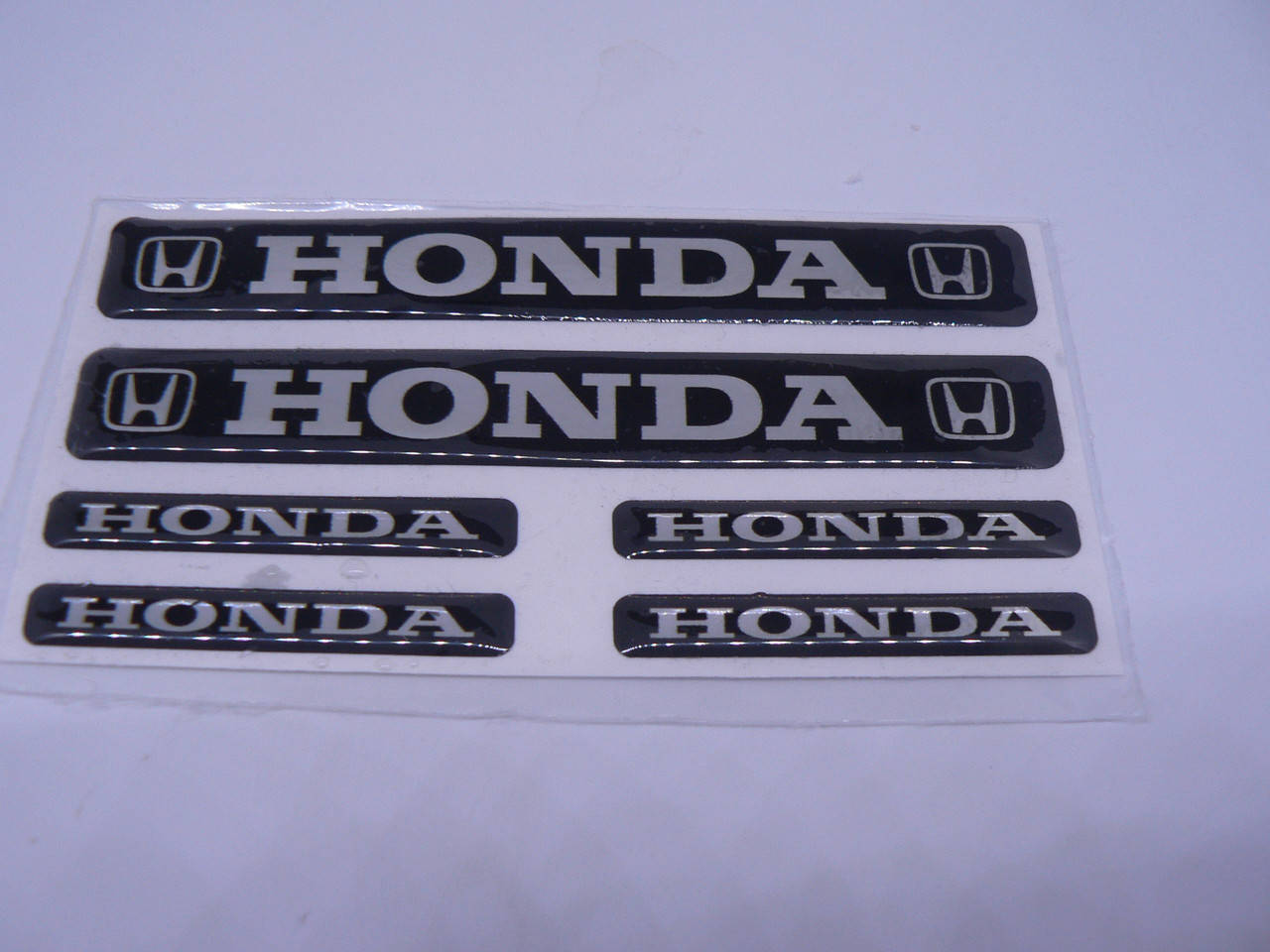 Наклейка S маленькая Honda набор 6шт (2шт-11х1,5см и 4шт 5х0,7см) силиконовая надпись на авто эмблема Хонда
Наклейка S маленькая Honda набор 6шт (2шт-11х1,5см и 4шт 5х0,7см) силиконовая надпись на авто эмблема Хонда