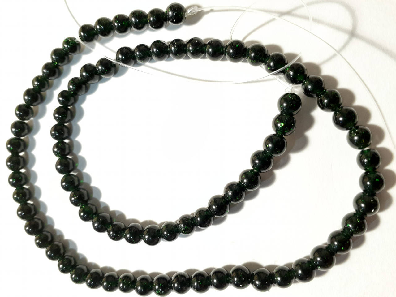 Бусины на нитке зеленый Авантюрин гладкий шарик d-5.5мм(+-) L-37см
Бусины на нитке зеленый Авантюрин гладкий шарик d-5.5мм(+-) L-37см