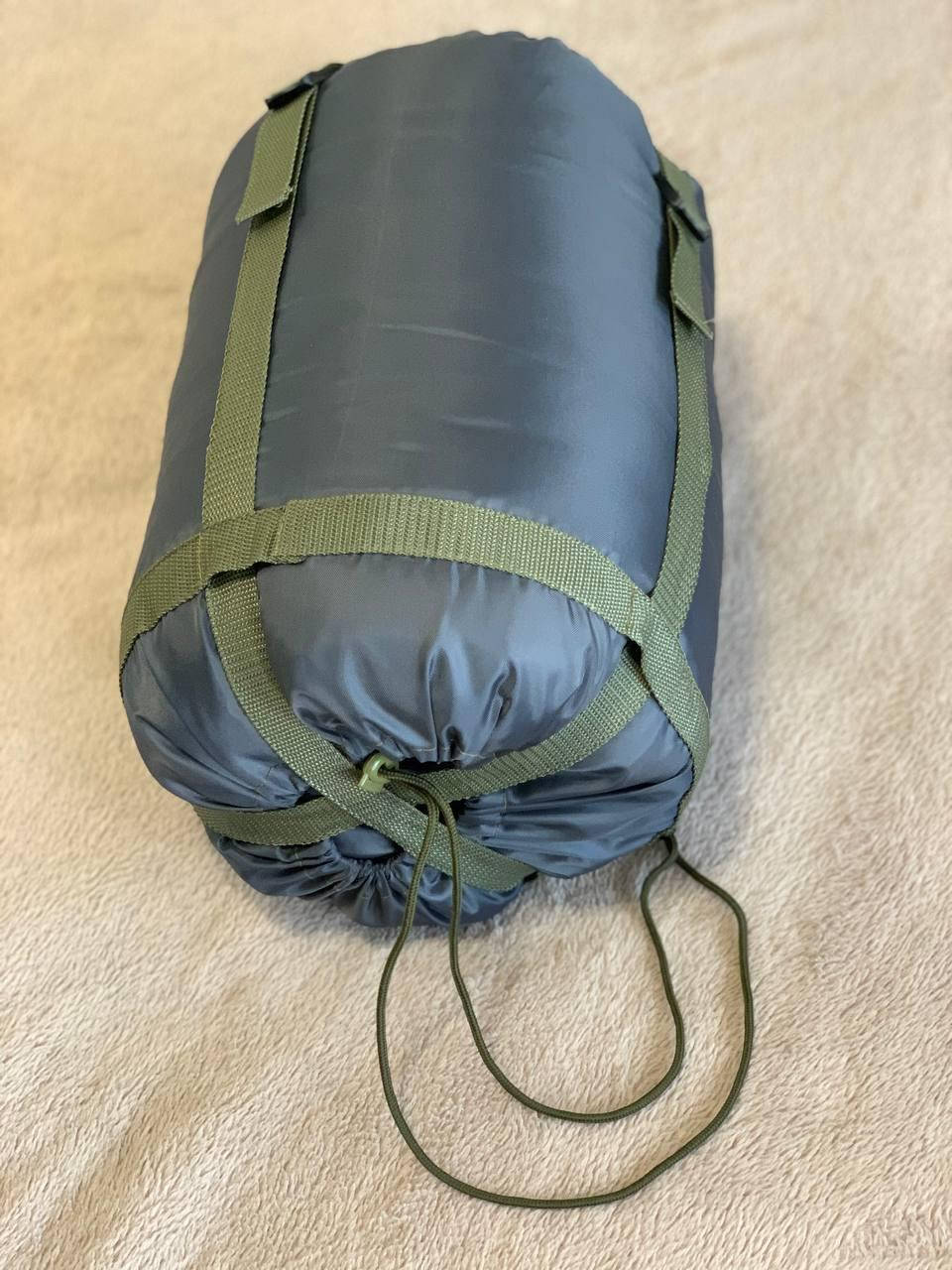 Тактический теплый спальный мешок / спальник серый компрессионный мешок Sleeping Bag 2 original
Тактический теплый спальный мешок / спальник серый компрессионный мешок Sleeping Bag 2 original