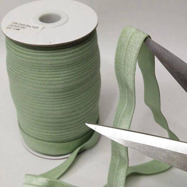 А-065 Трикотажная окантовочная бейка с блеском (стрейч эластичная) 1,5см х 1м. (оливка) (СИНДТЕКС-1448)
А-065 Трикотажная окантовочная бейка с блеском (стрейч эластичная) 1,5см х 1м. (оливка) (СИНДТЕКС-1448)