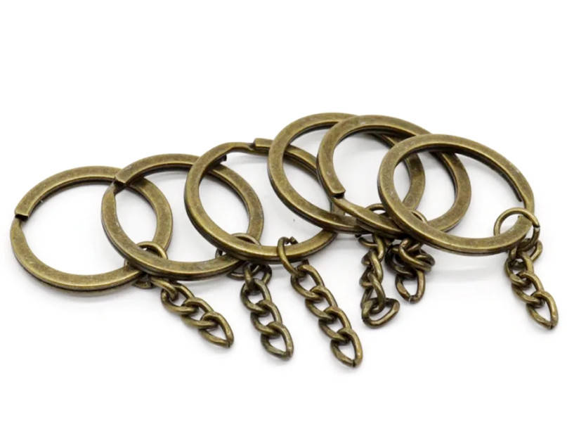 Кольцо плоское с цепочкой бронза 28 мм основа для брелка
Кольцо плоское с цепочкой бронза 28 мм основа для брелка