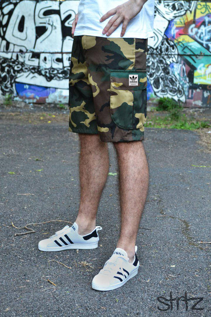 Летние камуфляжные мужские шорты/бриджи/капри карго с карманами адидас (Adidas)
Летние камуфляжные мужские шорты/бриджи/капри карго с карманами адидас (Adidas)