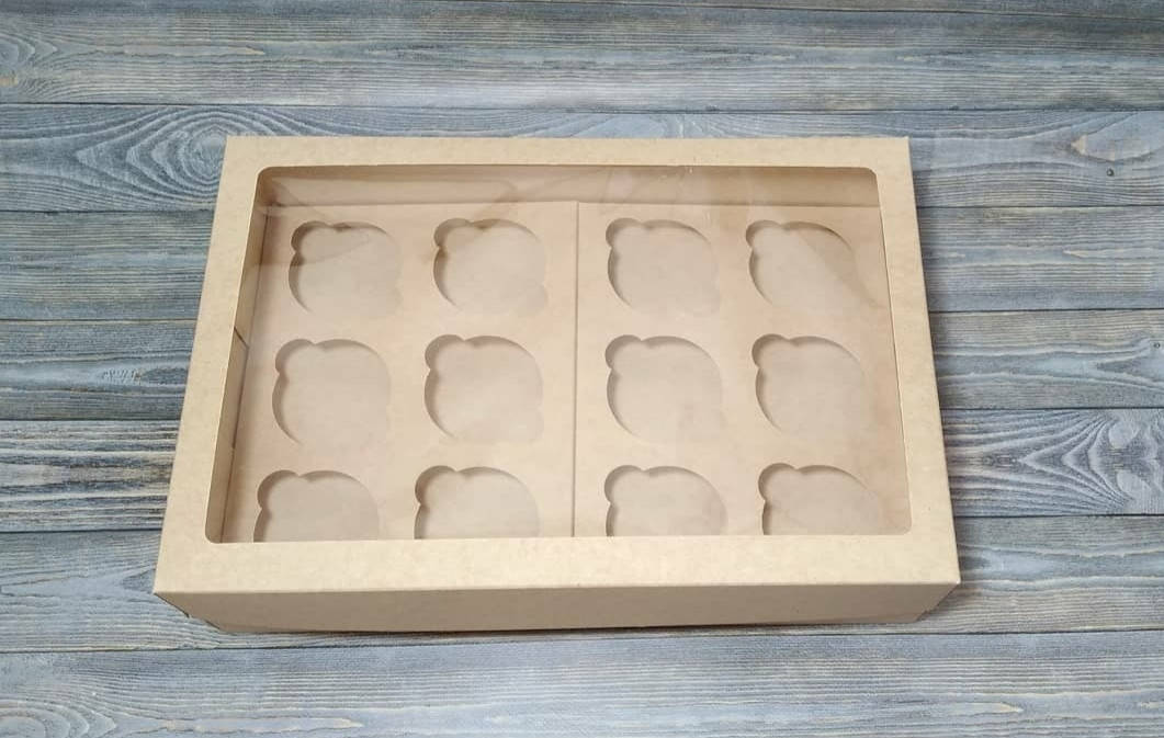 Коробка крафт для 12 кексів, маффінів, капкейків / 12 кексов, маффинов, капкейков. 354х241х90мм із вікном.
Коробка крафт для 12 кексів, маффінів, капкейків / 12 кексов, маффинов, капкейков. 354х241х90мм із вікном.