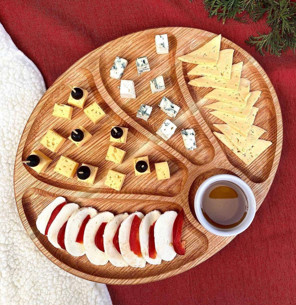 

Деревянная овальная менажница 30*35 см