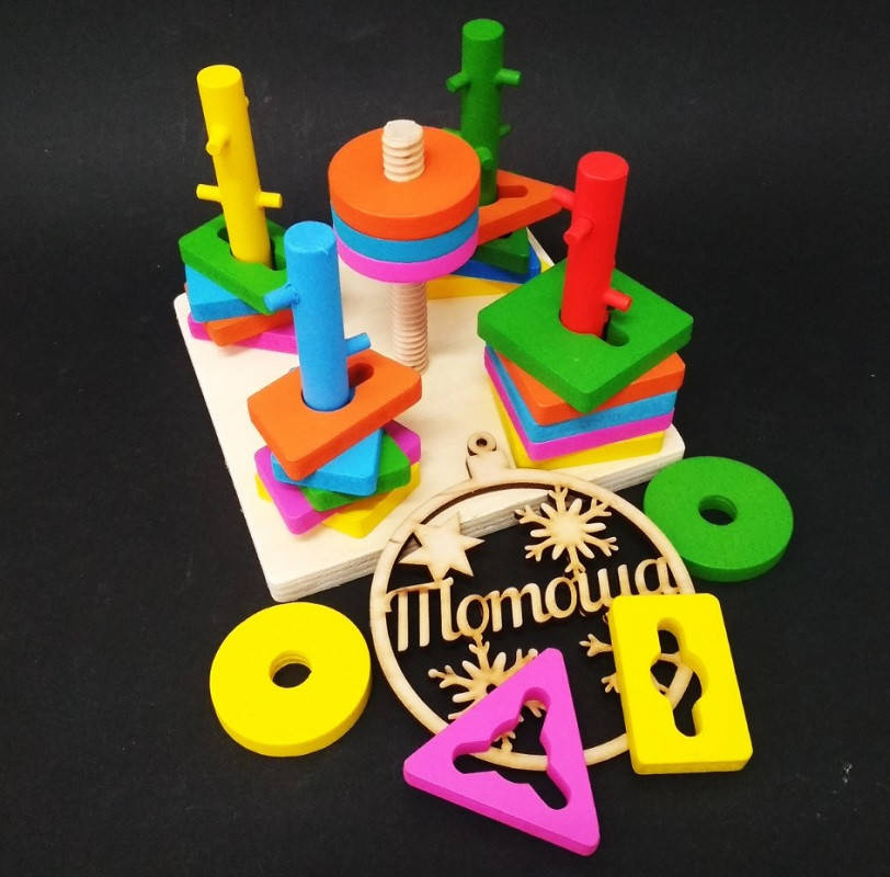 

Деревянная игрушка Логическая пирамидка ключ, сортер (Логічна пірамідка) MD0061