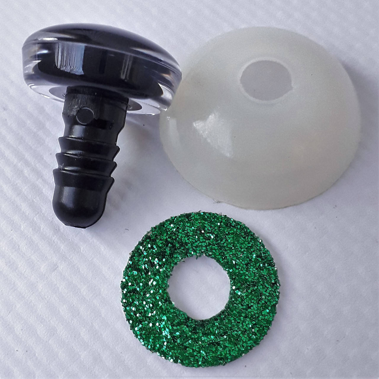 

Глазки для игрушек 14мм, глитерные, с заглушкой. Зеленые.