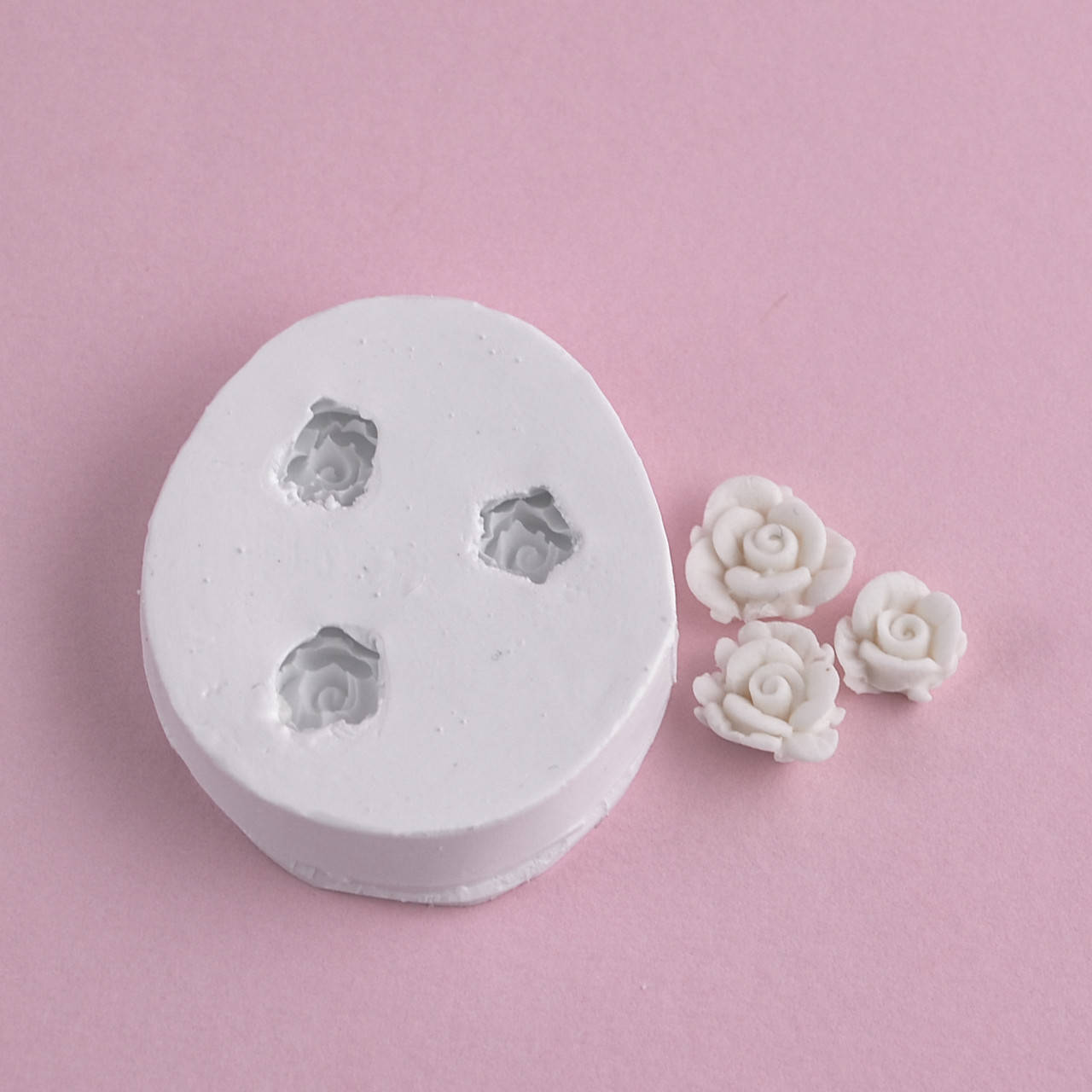 

Силиконовый молд Маленькие розочки 4.4х3.8 см