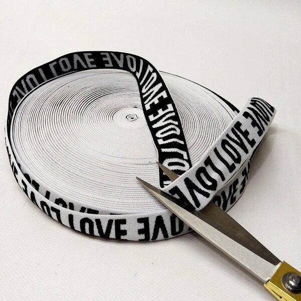 

Резинка поясная 2,5см черно-белая с надписью Love (СИНДТЕКС-1828)