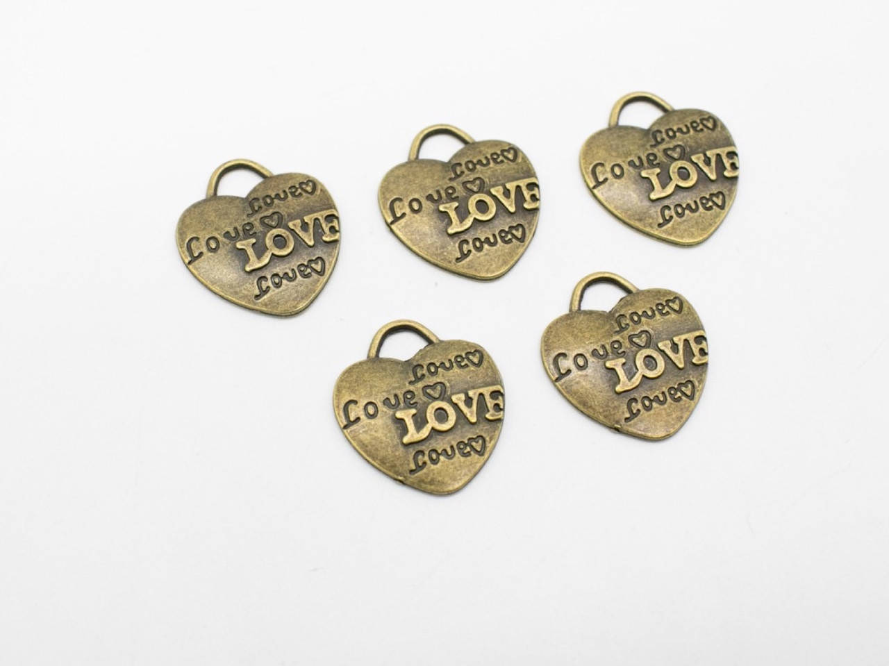 

Металлические накладки. Цвет "античная бронза". Сердце. 21х23мм