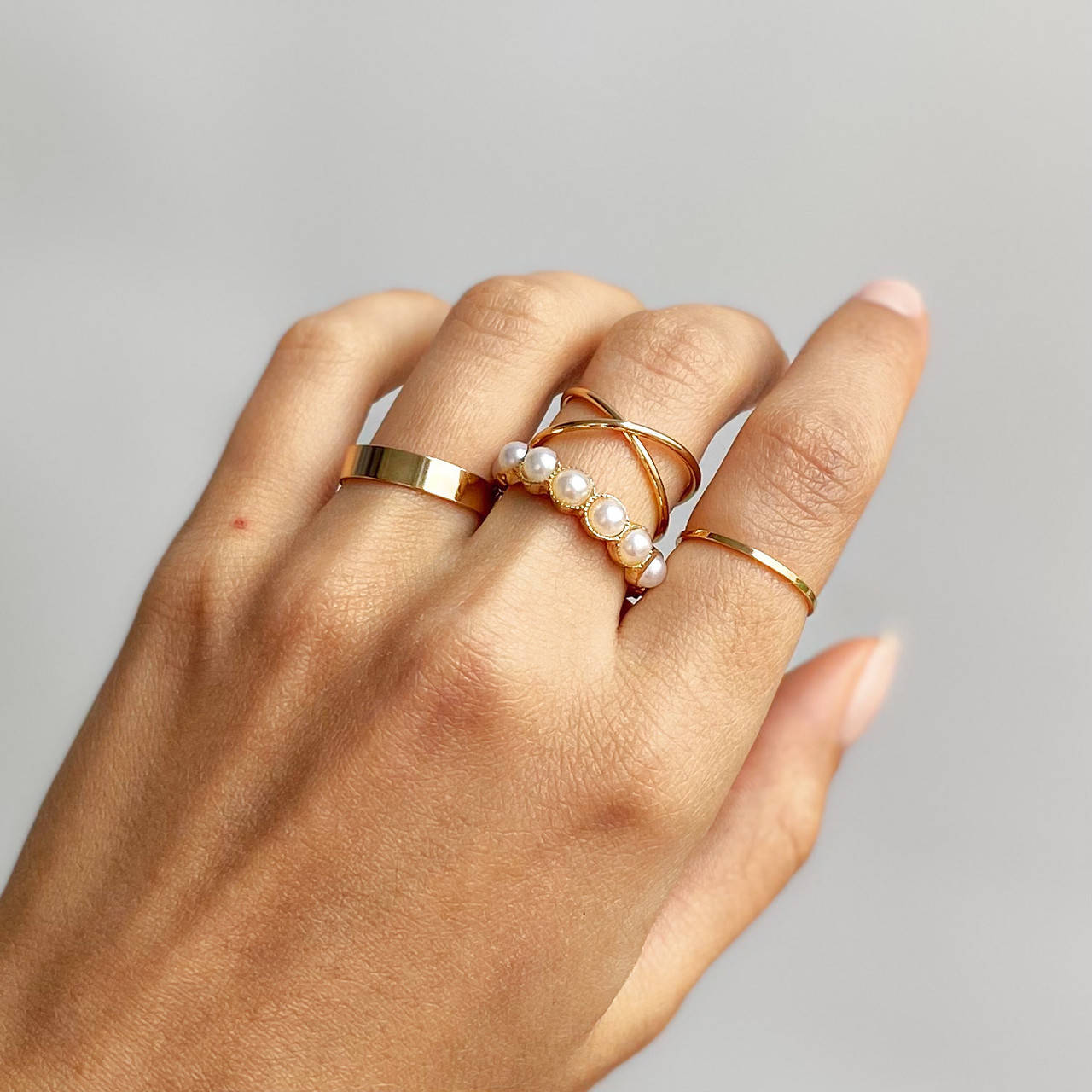 

Набор колец з жемчугом золотистого цвета 4 единиц Docona