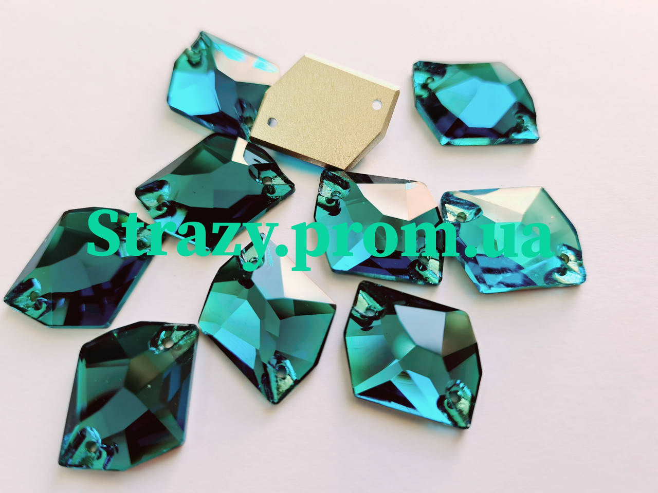 

Стразы пришивные SWARO Космик 17*21мм. Blue Zircon
