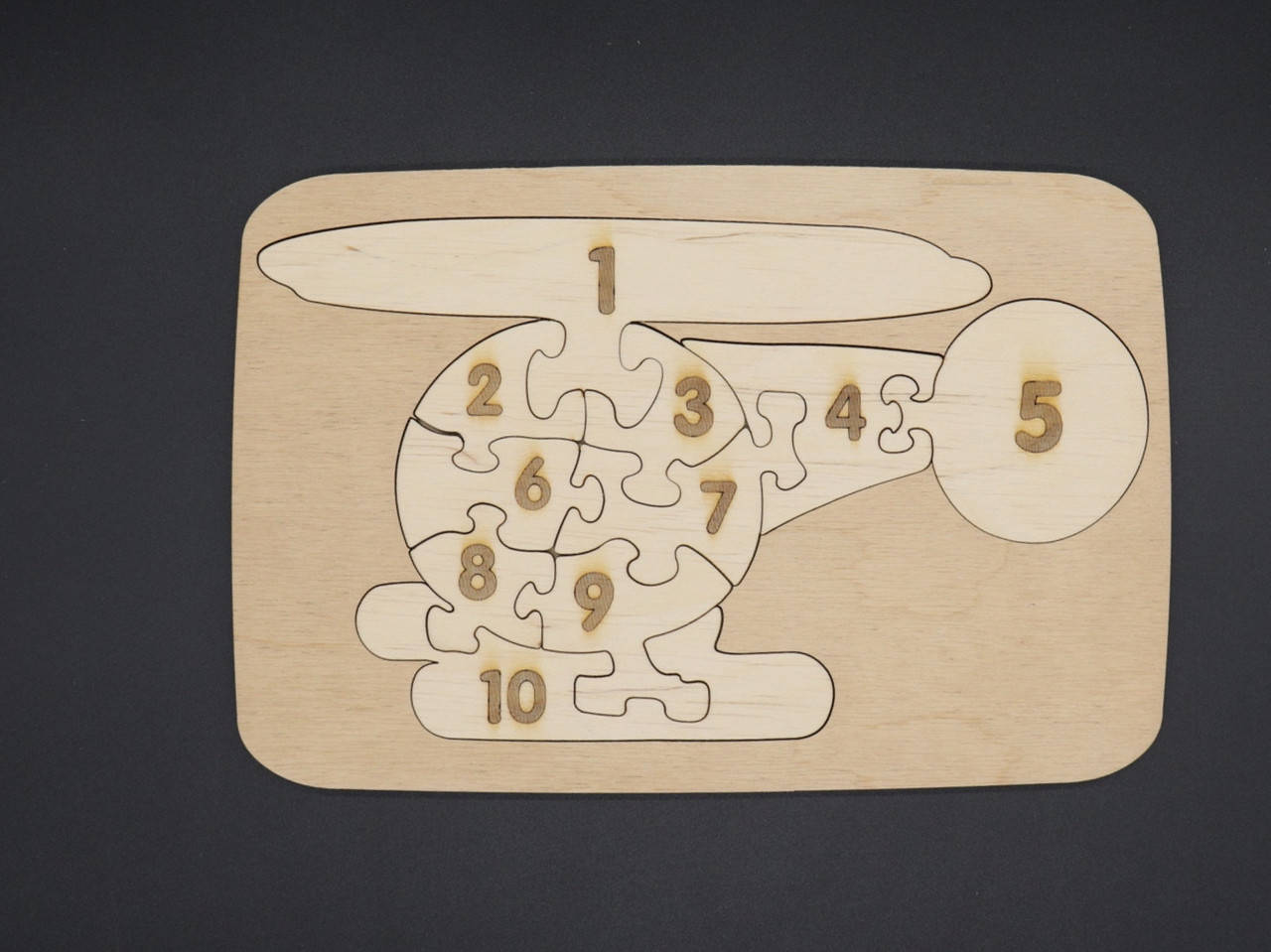 

Деревянный пазл "Вертолёт". Цифры. 25х16,5см