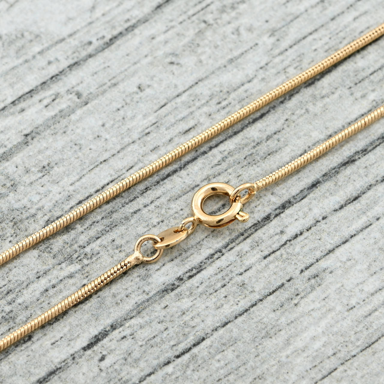 

Цепочка Змейка 33144 ширина 1 мм позолота 18К длина 35